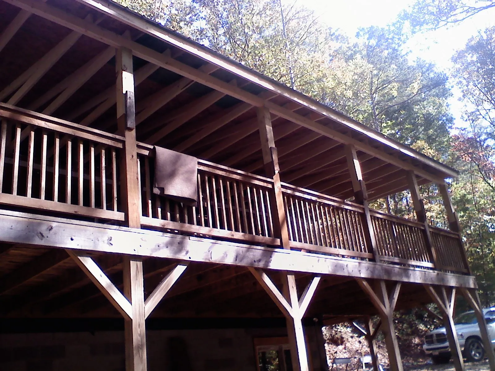Timber framing under a new elevated porch and deck — Roof Leak Repair in Londonderry by Roofing Brothers